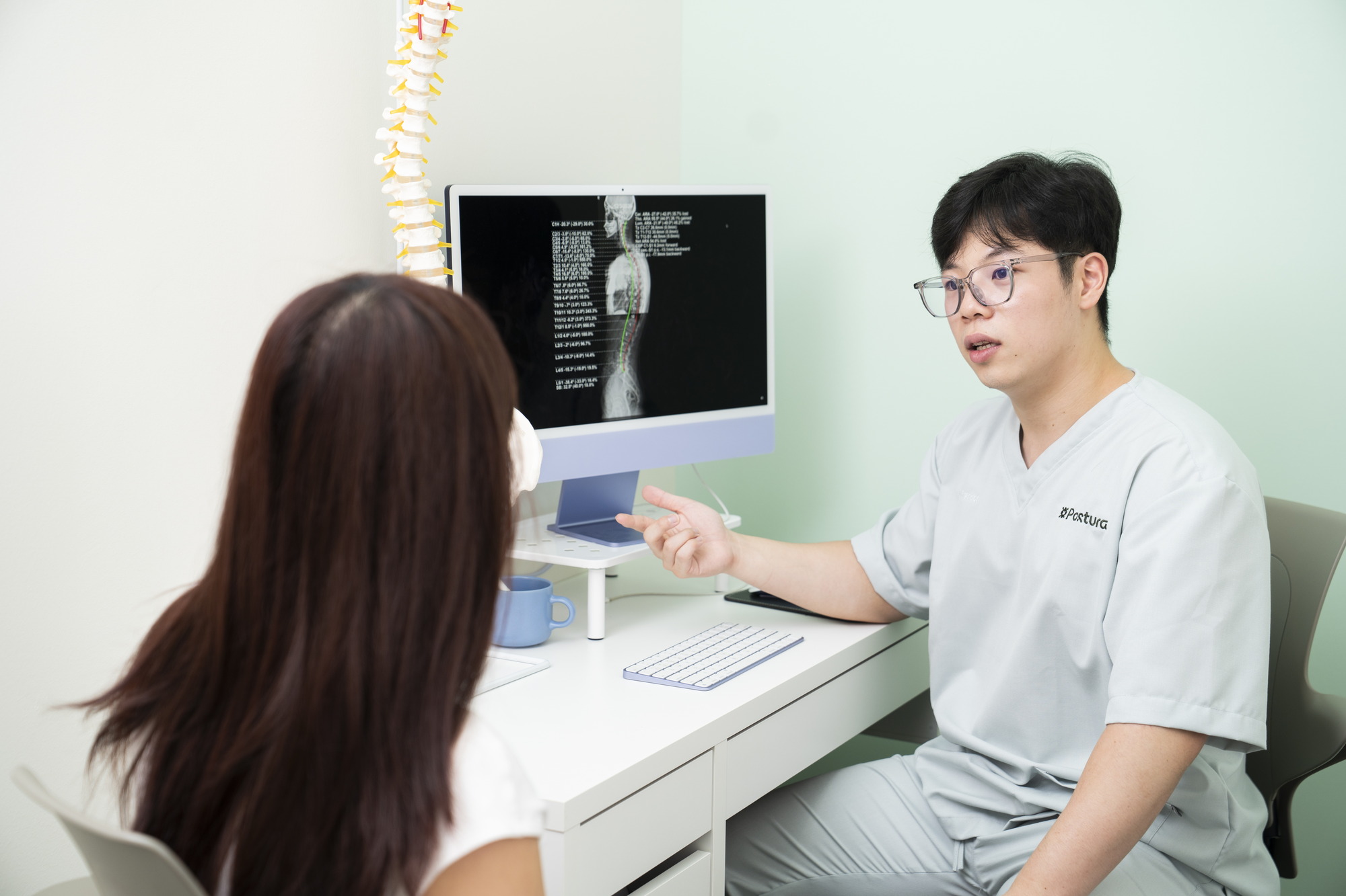 A consultation at Postura Wellness